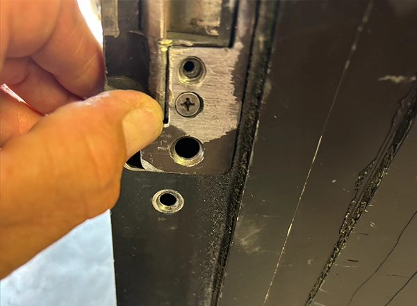 Mattlock locksmith repairing a damaged commercial door lock in Las Vegas