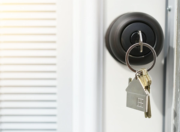 Newly rekeyed door lock with house-shaped keychain by Mattlock Las Vegas locksmith