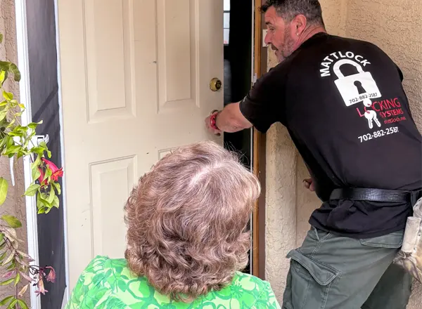 Mattlock locksmith helping a Las Vegas residential client at her front door